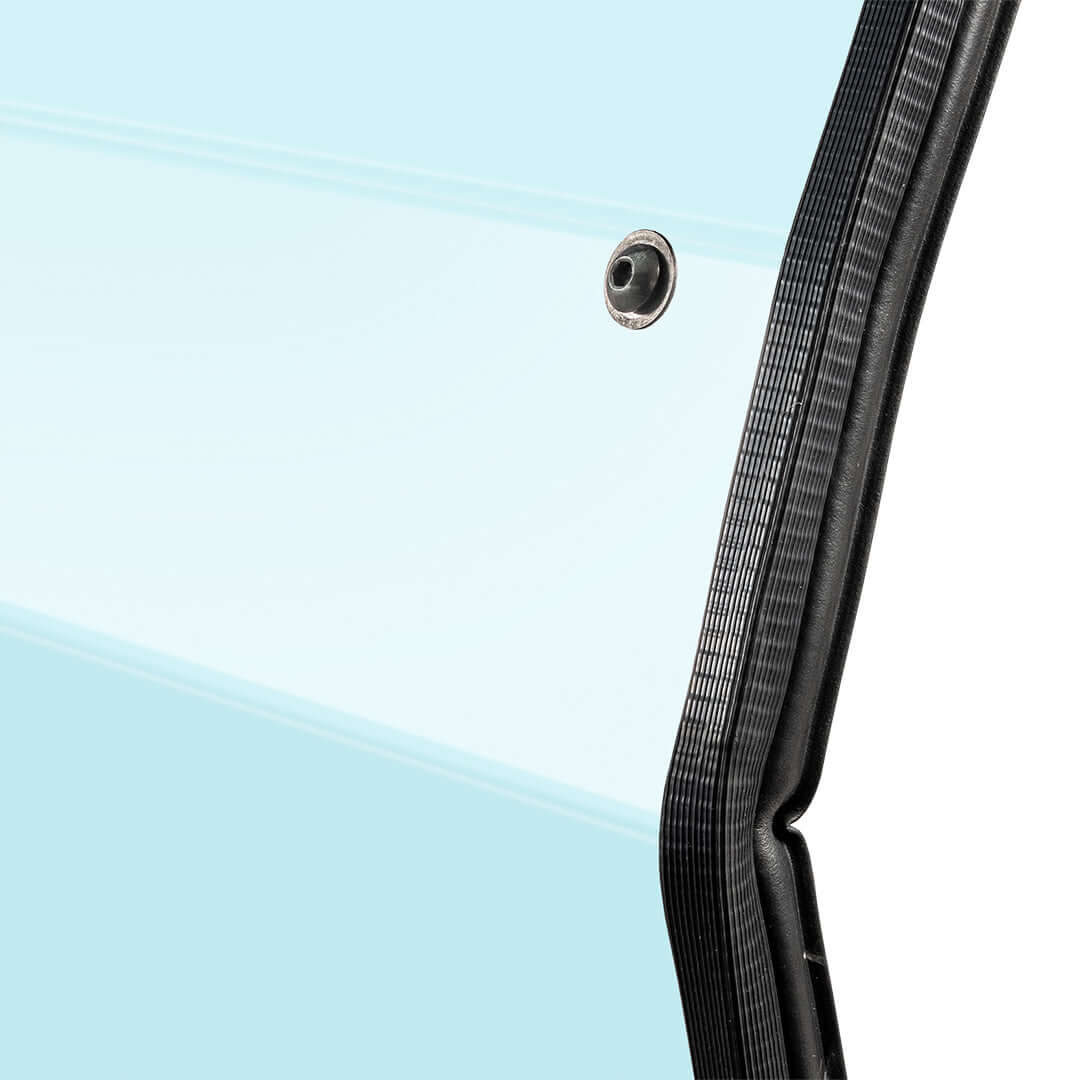Close-up of Segway UT10 polycarbonate rear windshield showcasing durable edge and fastening hardware.