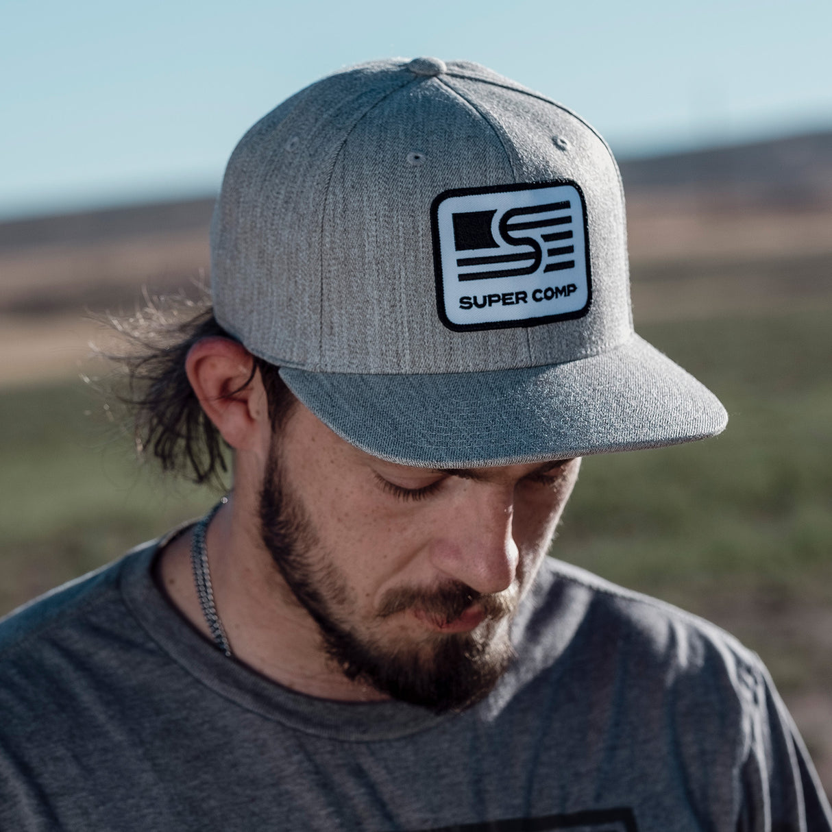 Photo of Snapback Flex fit Flat brim Cap With Patch by Super Comp USA - Premium Apparel for UTVs / Side by Sides