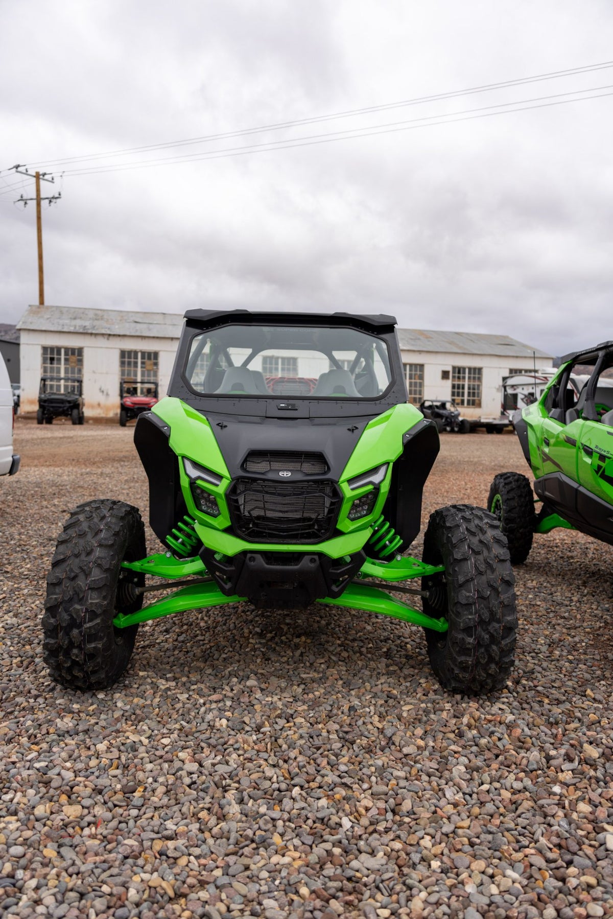 Photo of Kawasaki Teryx H2 Vented Front Windshield by Super Comp - Premium Glass Front Windshield for UTVs / Side by Sides